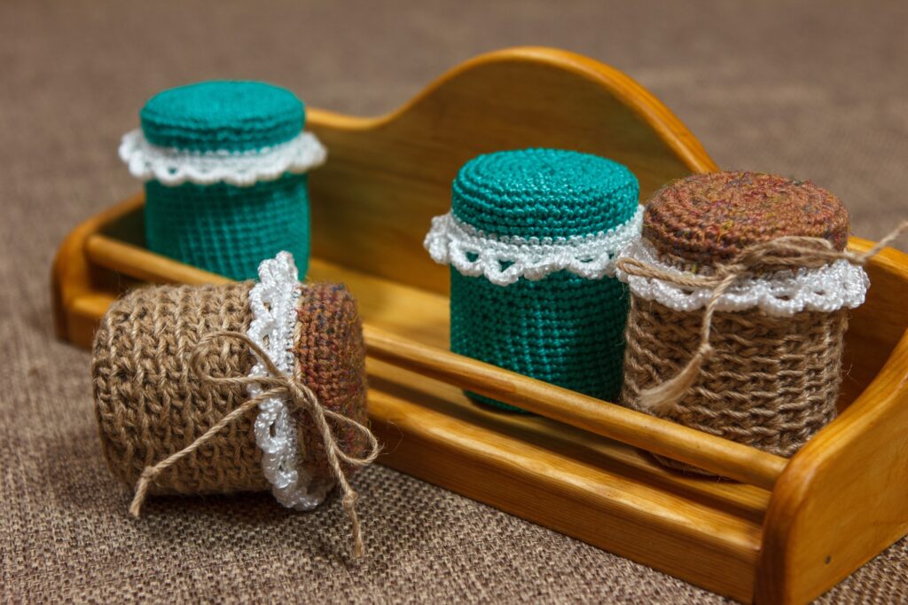 Jars tied with jute thread. Eco-friendly materials for storage. Handmade products.